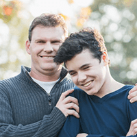 tightly cropped image of parent and child