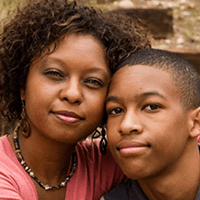 tightly cropped image of parent and child